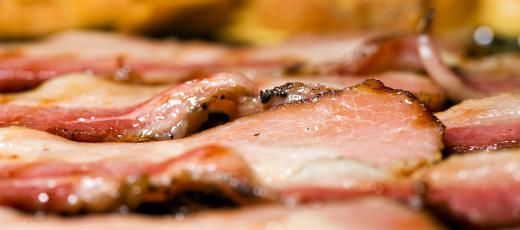 Made with beef tongue, mechado lengua is frequently served with fried bacon.