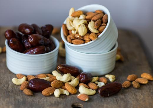 Roasted almonds can be paired with other foods like dates and cashews.