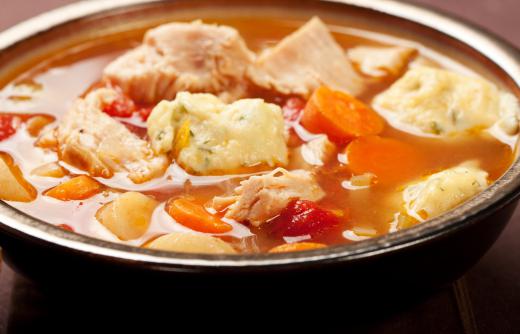 Chicken stew consists of pieces of chicken and vegetables.