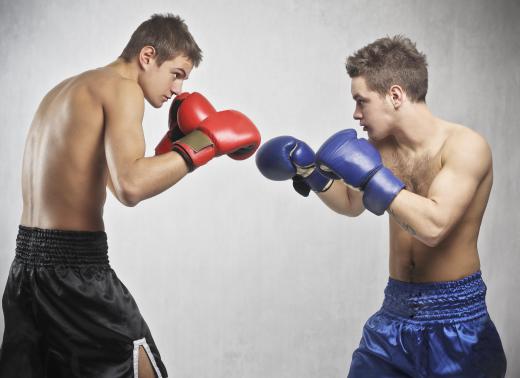 Boxing gloves protect fighters' hands as they throw punches.