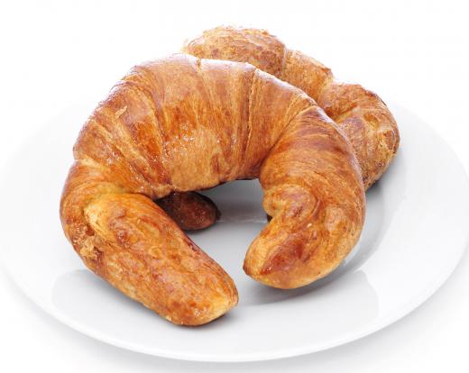 Croissants can be toasted using an egg toaster.