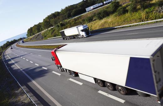 Many trucking companies advertise their business on the sides of their trailers.