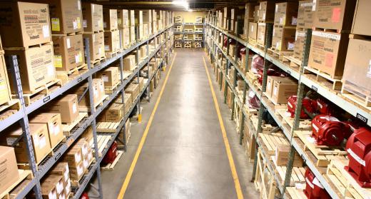 A warehouse management system controls the flow of goods through distribution systems.