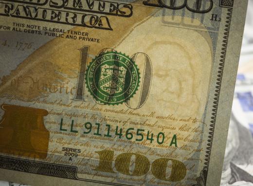 The $100 federal reserve note contains a watermark of Benjamin Franklin as a security measure.