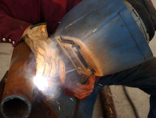 Apprentice welders work under the tutelage of experienced welders.