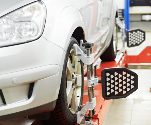 A collision repair technician might need to realign the wheels of a car after an accident.