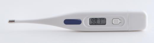 Temperature is typically measured using an oral thermometer.