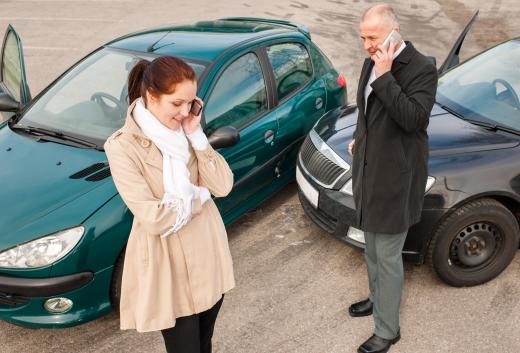 Insurance adjusters investigate auto insurance claims.