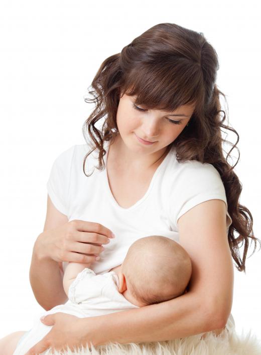 A wet nurse breastfeeds a baby for a mother.