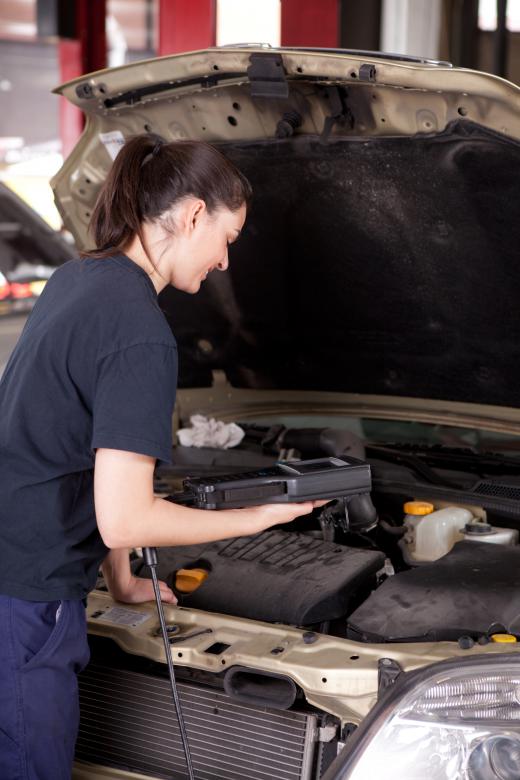 A truck mechanic working.