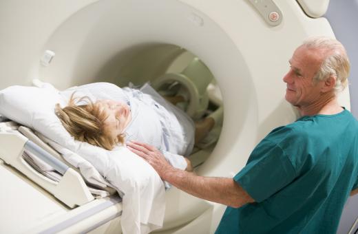 An epileptic patient may undergo frequent CT scans to determine the cause of her seizures.