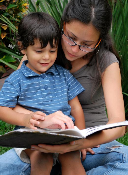 Tutors might read books to students in Spanish to help them improve vocabulary.