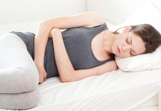 Abdominal cramps are more common during the period, rather than before the period.