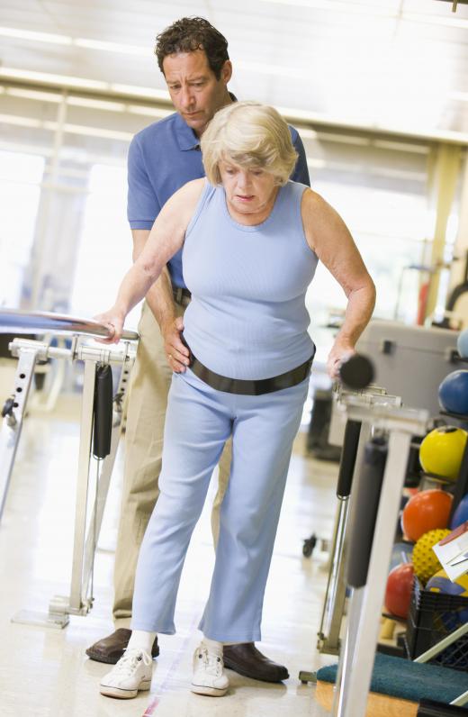 In some gate therapy cases, a person will need to begin walking while holding onto parallel bars in order to build enough strength in her legs.