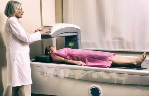 A bone densitometry scan measures bone mineral density to evaluate bone density loss.