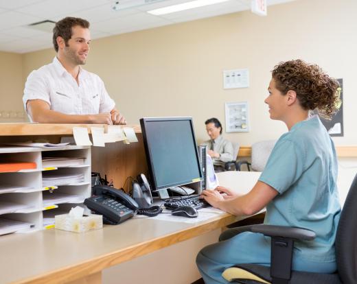 Many waiting rooms feature a receptionist desk where paperwork and other administrative needs are handled.