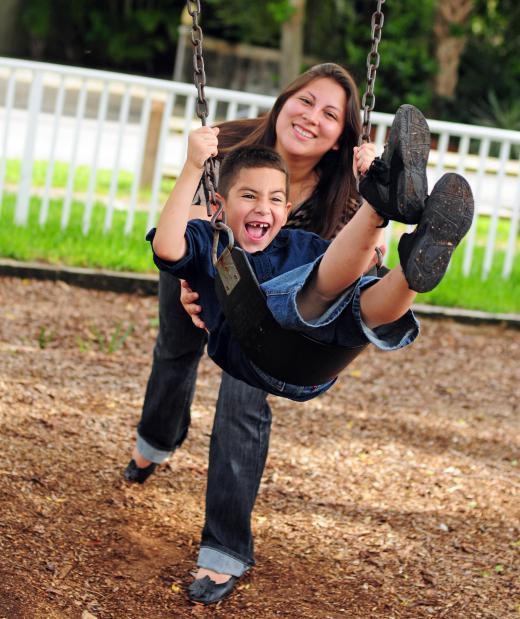 Playground equipment like swing sets can make backyards more fun.