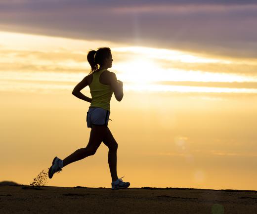 Jogging at night can be made safer by wearing reflective clothing, running in familiar and well-lit areas, and, if possible, taking along a partner.