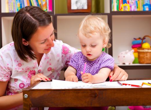 A child suffering from developmental delay may have difficulty learning how to write.