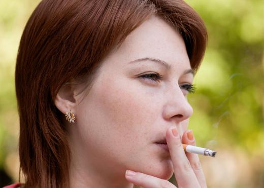 Woman smoking a cigarette.