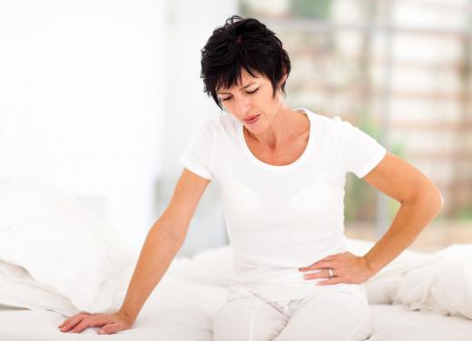 Pain in the abdomen can be a symptom of bladder obstruction.