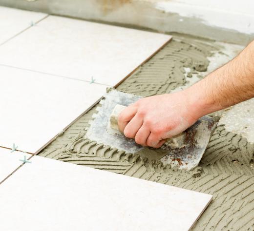 Many jobs require the tile setter to cut the flooring to size before installation.