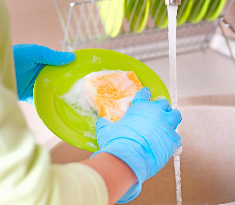 wearing gloves while washing dishes