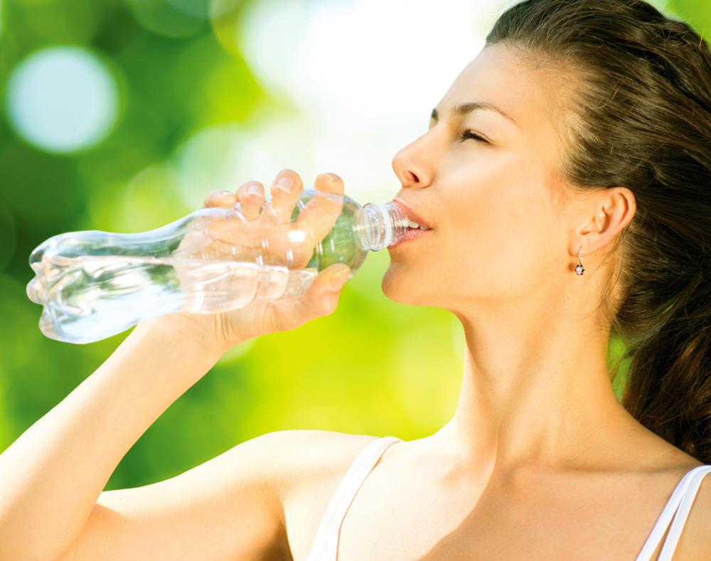 drinking a water bottle